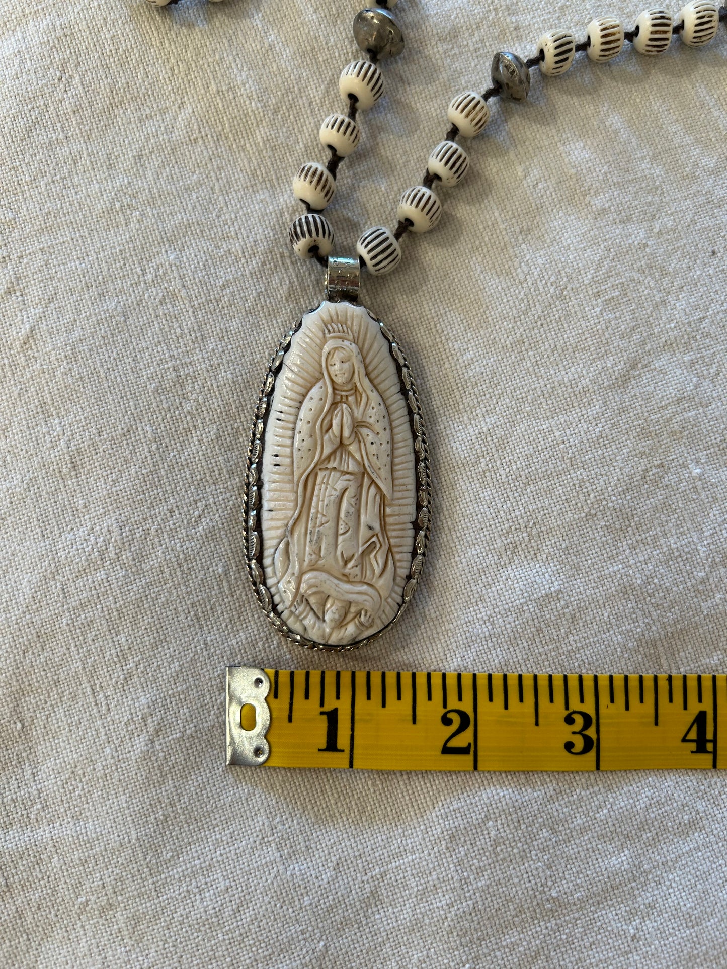 carved bone guadalupe beaded necklace