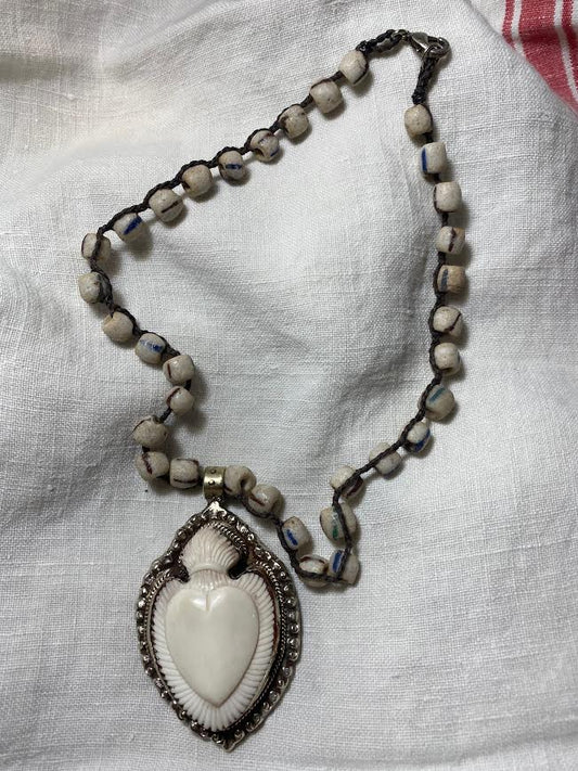 carved bone heart necklace with trade beads