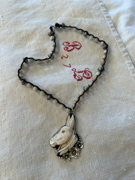 carved bone donkey necklace