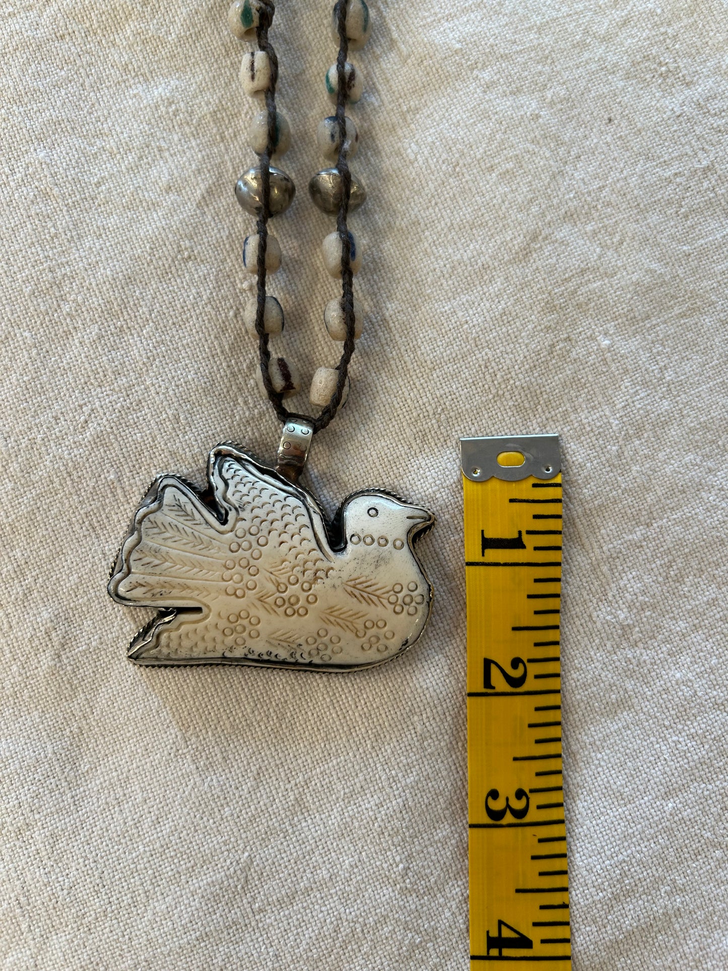 carved dove trade beaded necklace