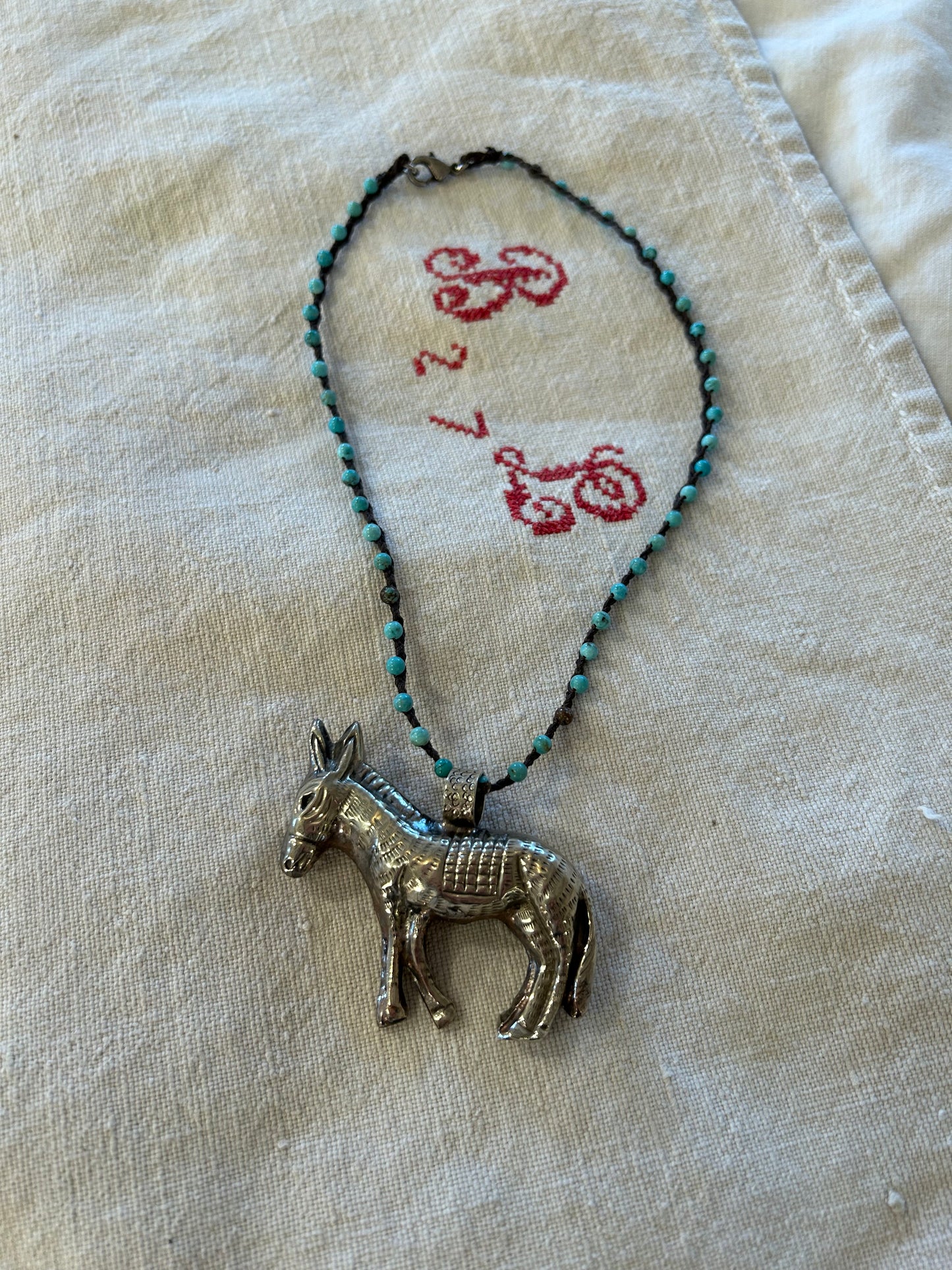 silver donkey turquoise beaded necklace