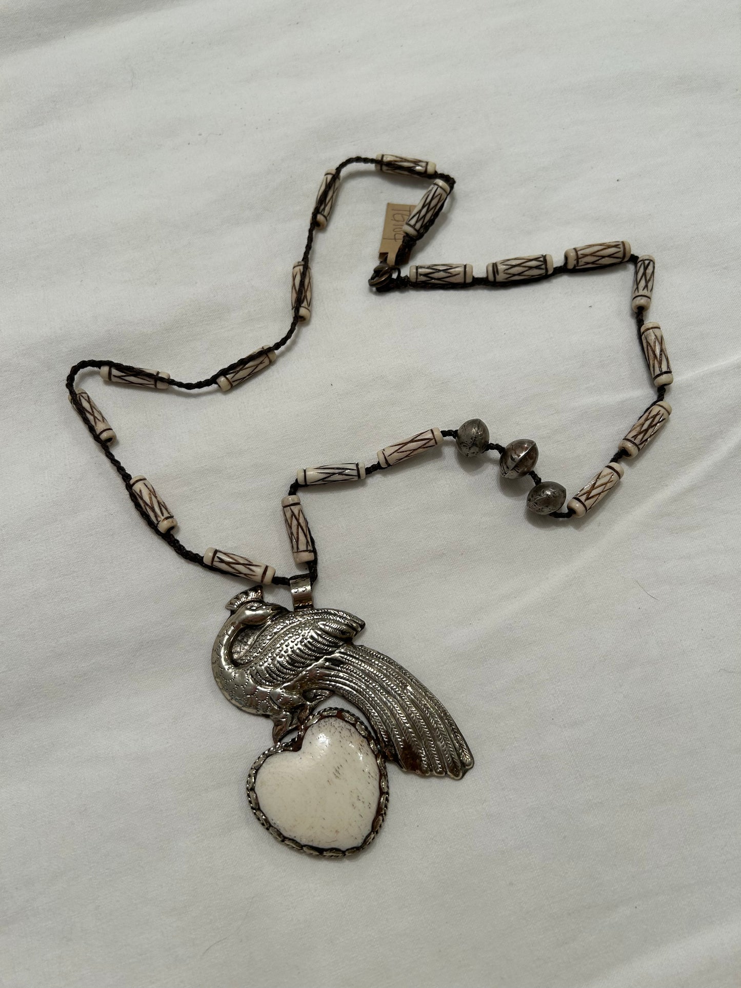 carved bone and bird necklace with carved bone beads